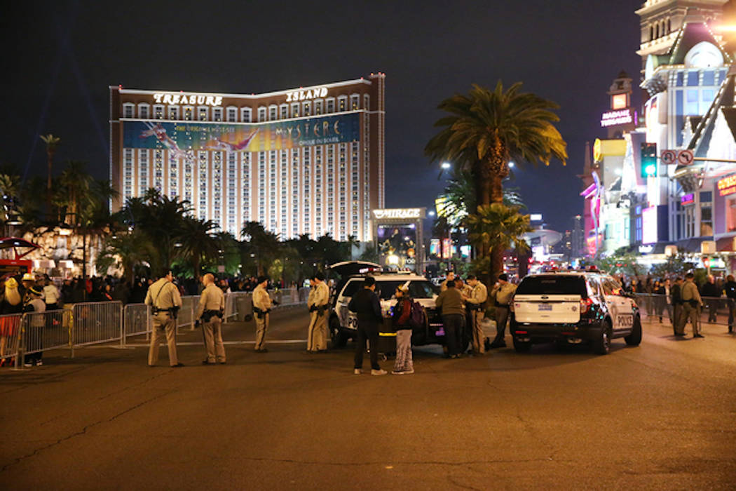 Las Vegas police officer monitor the Strip near The Mirage hotel-casino on New Year's Eve, Saturday, Dec. 31, 2016. (Erik Verduzco/Las Vegas Review-Journal)