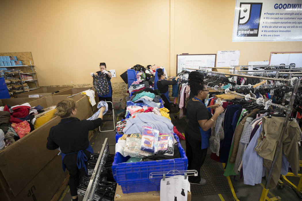 Workers sort though clothing donations at the Goodwill store located at 1390 American Pacific Drive in Henderson on Thursday, Dec. 28, 2017. Richard Brian Las Vegas Review-Journal @vegasphotograph
