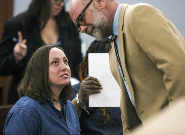 Kirstin Lobato, left, who has long claimed her innocence in a 2001 killing, talks to her attorney Travis Barrick in Regional Justice Center on Wednesday Jan. 04, 2017. The Innocence Project has ag ...
