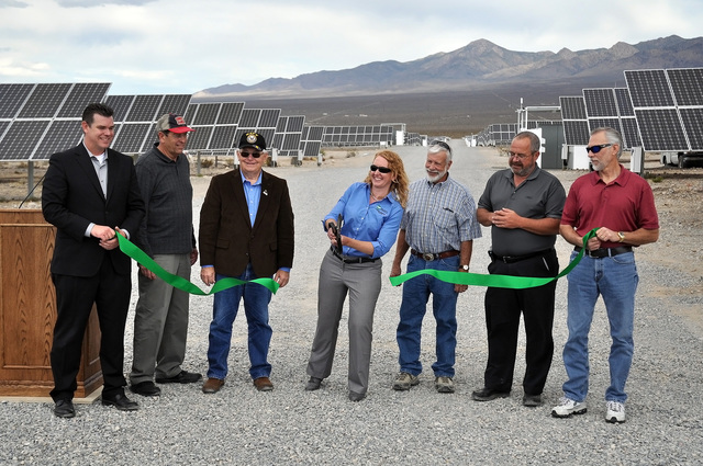 Horace Langford Jr. / Pahrump Valley Times - 
Valley Electric Association and Nye County officials cut the ribbon during a solar park dedication ceremony in late September. The energy co-op's boar ...