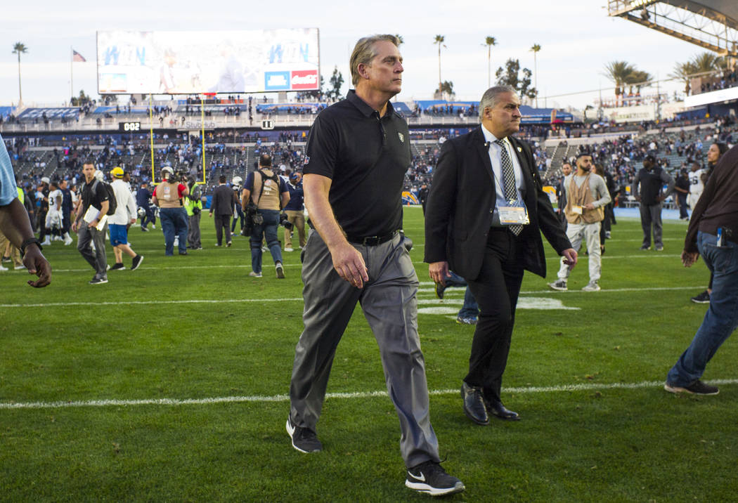 Oakland Raiders head coach Jack Del Rio walks off the field after his final game as head coach after losing 30-10 to the Los Angeles Chargers in an NFL game at StubHub Center in Carson, Calif. on  ...