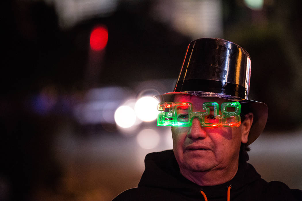 Helder Del Valle of San Francisco, 54, stands along the Strip on New Year's Eve in Las Vegas, Sunday, Dec. 31, 2017. Joel Angel Juarez Las Vegas Review-Journal @jajuarezphoto