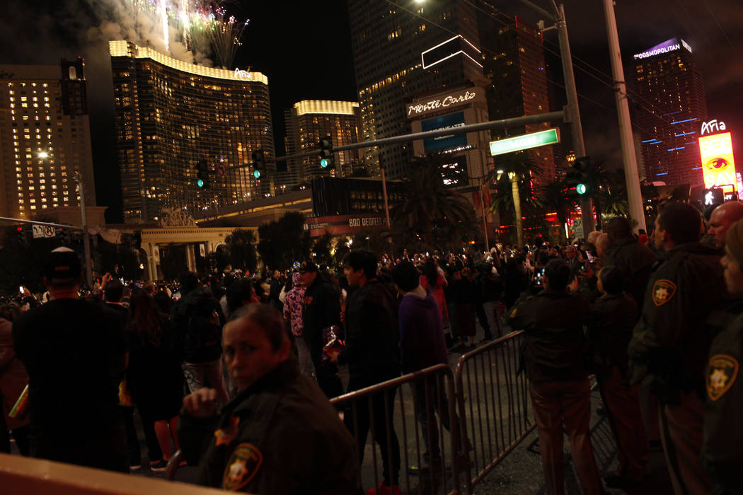 People gather along the Strip during the first minutes of New Year's Day in Las Vegas, Monday, Jan. 1, 2018. Joel Angel Juarez Las Vegas Review-Journal @jajuarezphoto