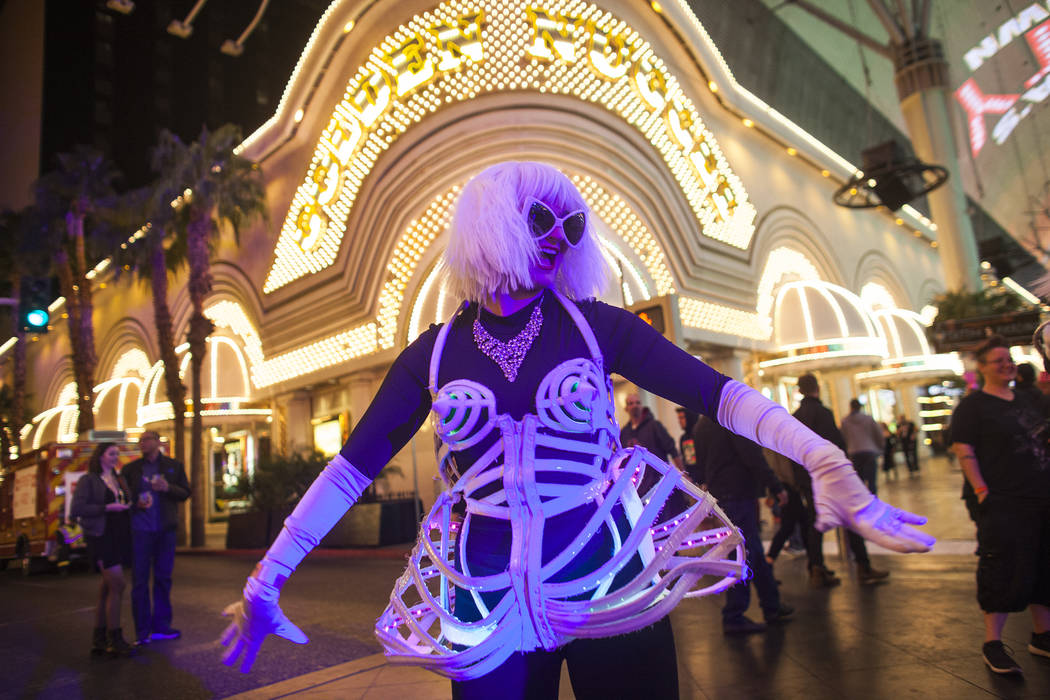 A dancer from the Champagne Creative Group dances at the Fremont Street Experience in Las Vegas, Sunday, Dec. 31, 2017. Rachel Aston Las Vegas Review-Journal @rookie__rae