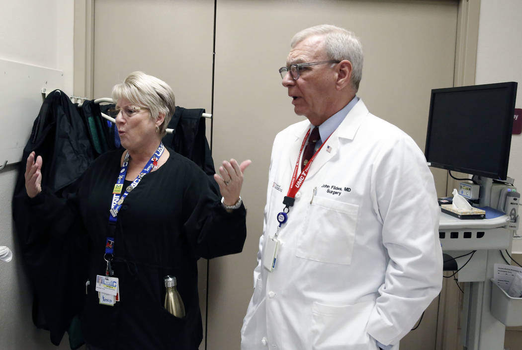 Dr. John Fildes, a trauma surgeon and University Medical Center's director of trauma, listens as Toni Mullan, a nurse, speaks during an interview with the Las Vegas Review-Journal at UMC's Trauma  ...