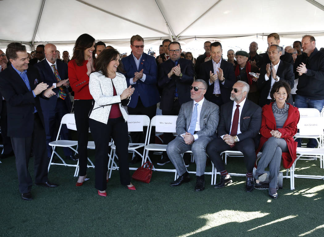 Frank Fertitta, left seated, Lorenzo Fertitta, and Vicki Fertitta, right, receive a standing ovation on Tuesday, Jan. 23, 2018 for their $10 million donation to UNLV to fund a 73,000-square-foot f ...