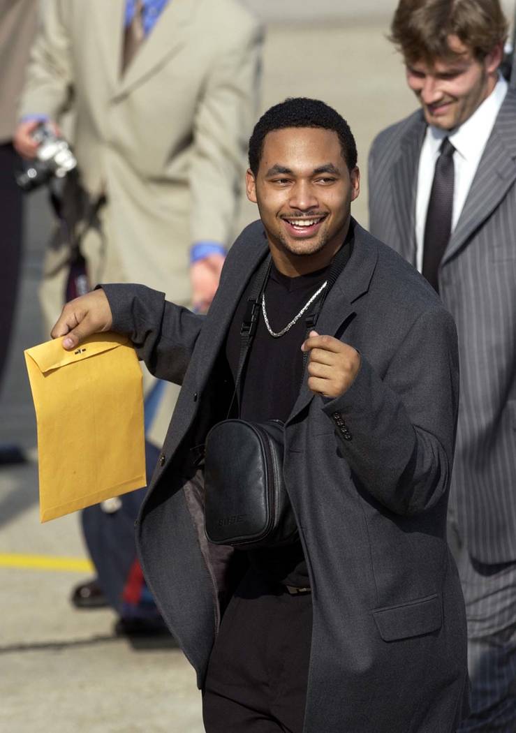 New England Patriots' Brock Williams dances to the sounds of the New Birth Brass Band on the tarmac afrter arriving in New Orleans Monday, Jan. 28, 2002. The Patriots will play the St. Louis Rams  ...