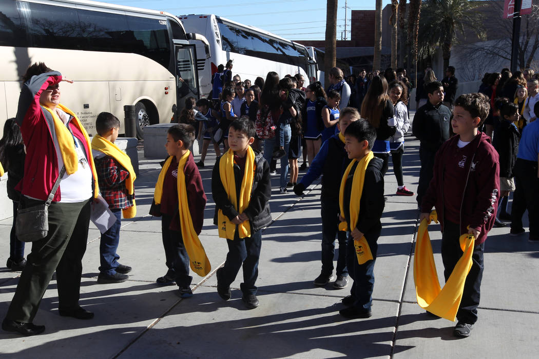 Students from Coral Academy arrive at the UNLV campus to celebrate National School Choice Week Tuesday, Jan. 23, 2018. Over 1,800 students, teacher and families watched several student performance ...