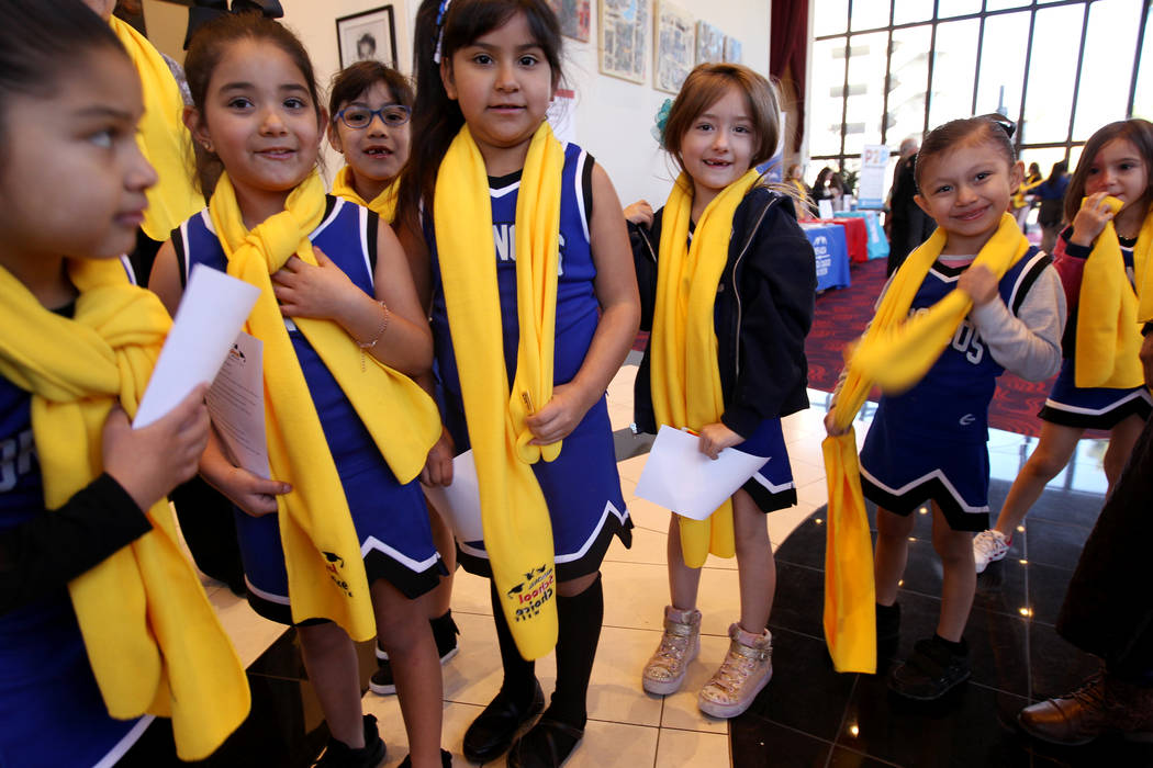 Mater Bonanza Academy students, from left, Ana Carrazco, Nyleve Michel, Heidi De La Cruz, Natalie Sandoval, Aaliah Dechant, Sophia Cordova, and Iztbeth Gonzalez, don scarves at UNLV to celebrate N ...