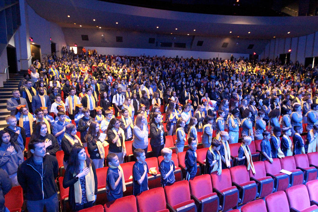 Students sing the National Anthem at UNLV to celebrate National School Choice Week Tuesday, Jan. 23, 2018. Over 1,800 students, teacher and families watched several student performances at Artemus ...