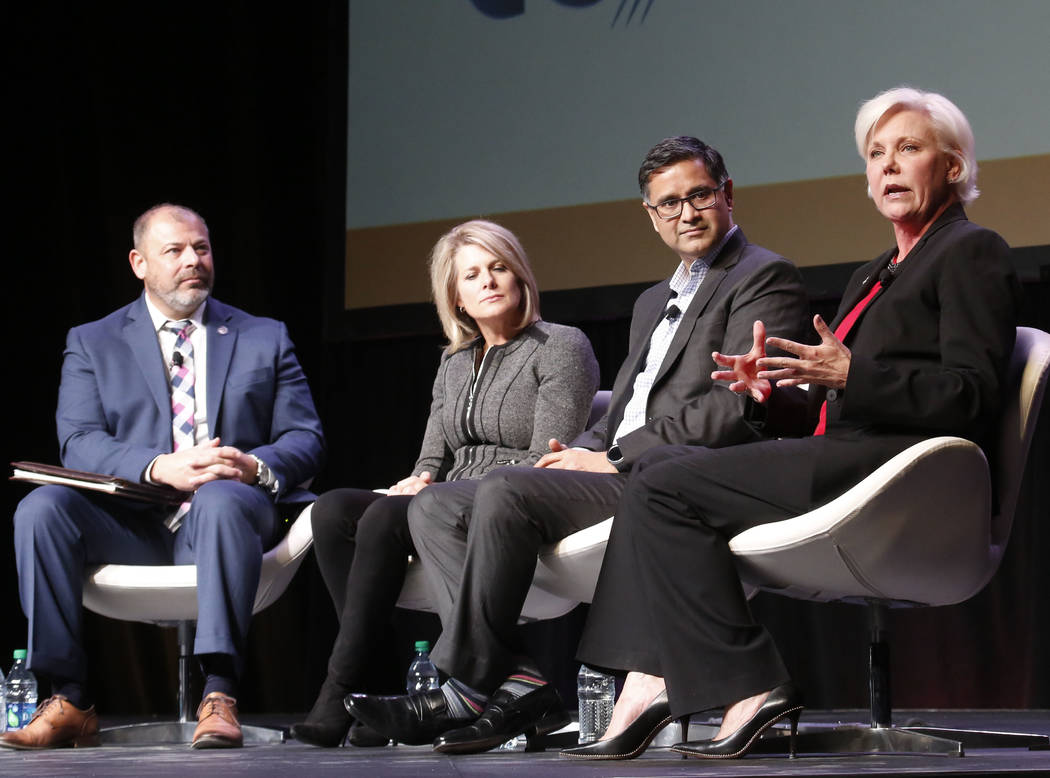 Paul Anderson, executive director, Governor's Office of Economic Development, left, Tina Quigley with the Regional Transportation Commission of Southern Nevada, Manu Namboodiri of Delphi, and Sall ...