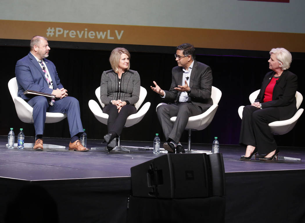 Paul Anderson, executive director, Governor's Office of Economic Development, left, Tina Quigley with the Regional Transportation Commission of Southern Nevada, Manu Namboodiri of Delphi, and Sall ...