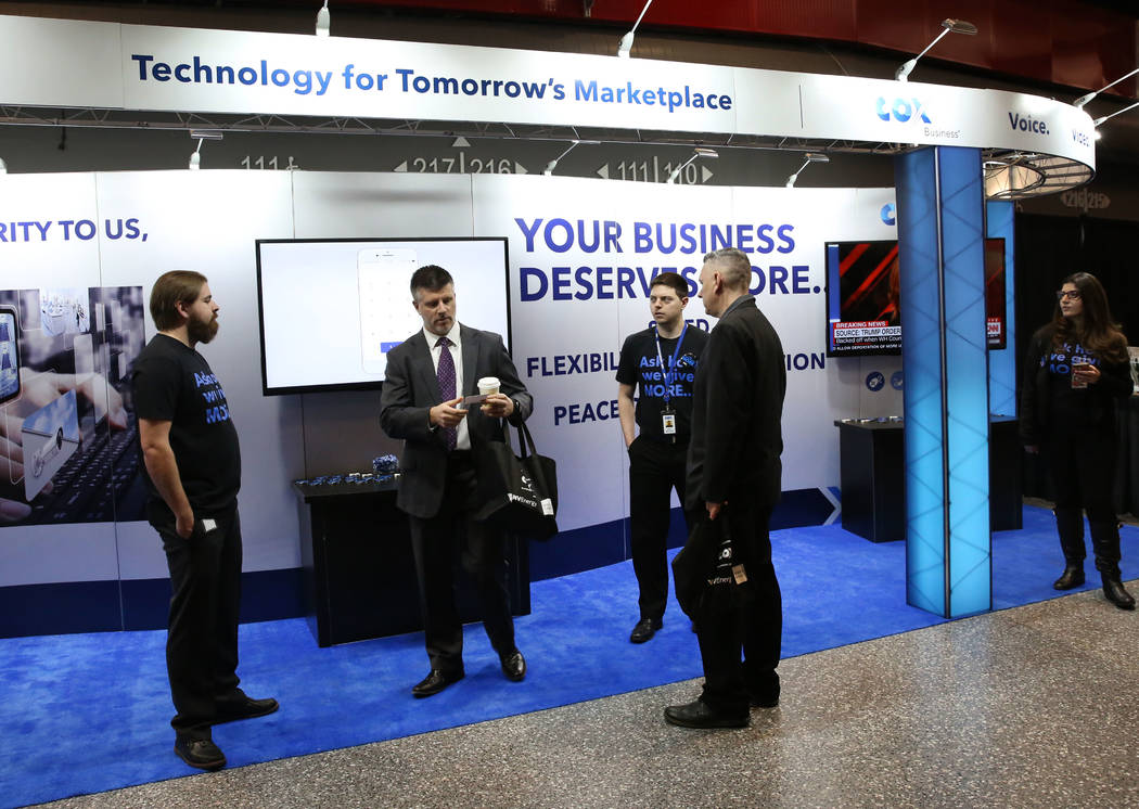 Exhibitgoers at COX booth during Preview Las Vegas, the Las Vegas Metropolitan Chamber of Commerce’s largest annual networking event, at Cox Pavilion on Friday, Jan. 26, 2018, in Las Vegas. ...