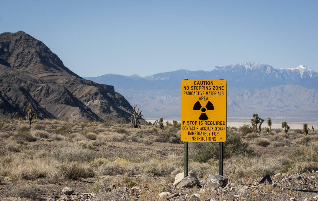 A sign warning of radioactive materials before entering an area for testing depleted uranium weaponry during a range tour on the Nellis Air Force Base on Sunday, May 21, 2017. Patrick Connolly Las ...