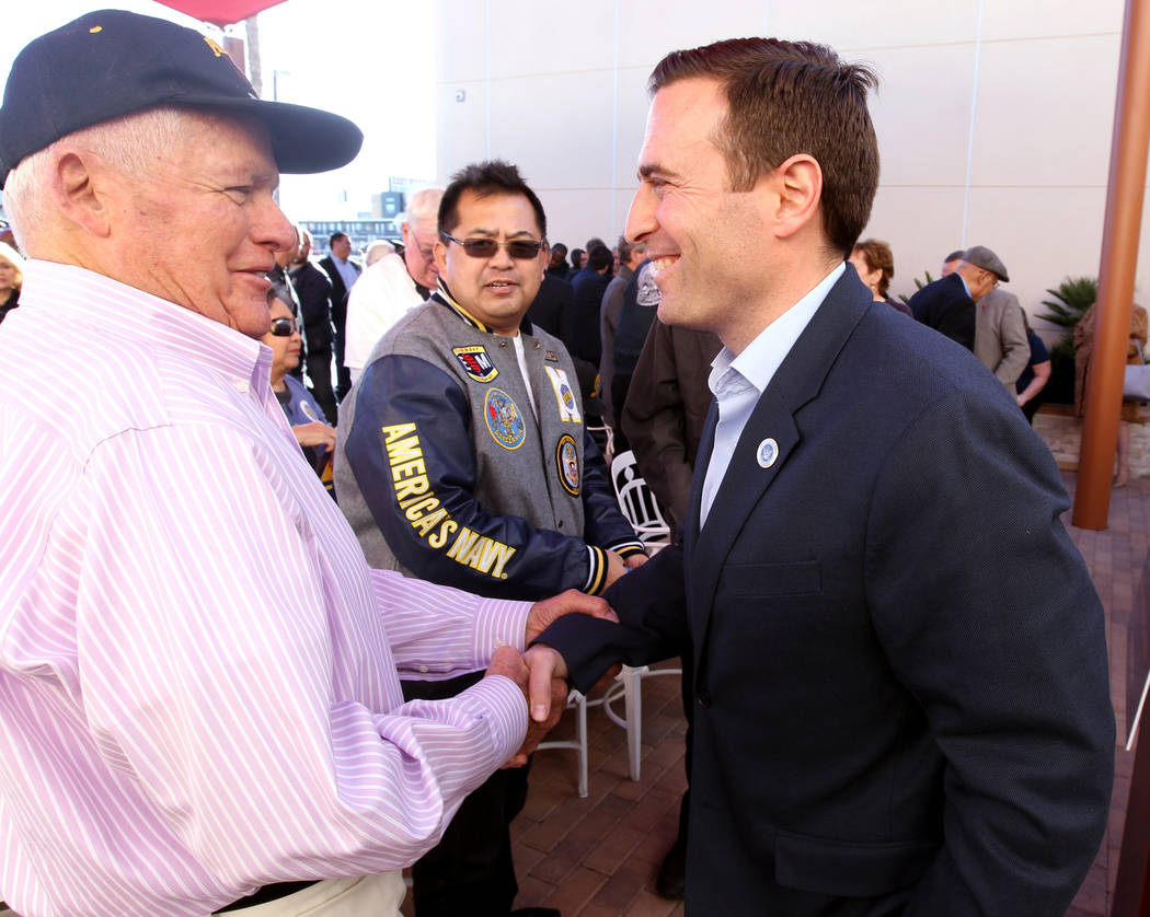 Republican gubernatorial candidate Nevada Attorney General Adam Laxalt, right, greets Frank Myers after speaking at Veterans Village in downtown Las Vegas Wednesday, Jan. 24, 2018. (K.M. Cannon/La ...