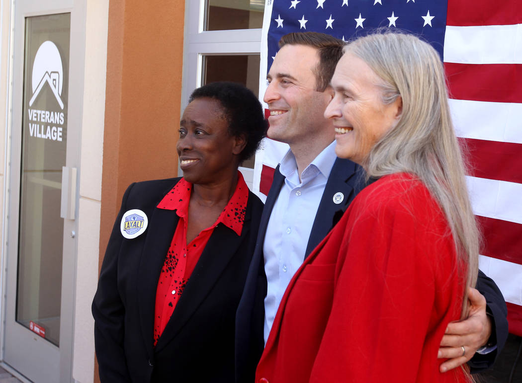 Republican gubernatorial candidate Nevada Attorney General Adam Laxalt, center, poses with Sandra Scott, left, and Dixie Thompson after speaking at Veterans Village in downtown Las Vegas Wednesday ...