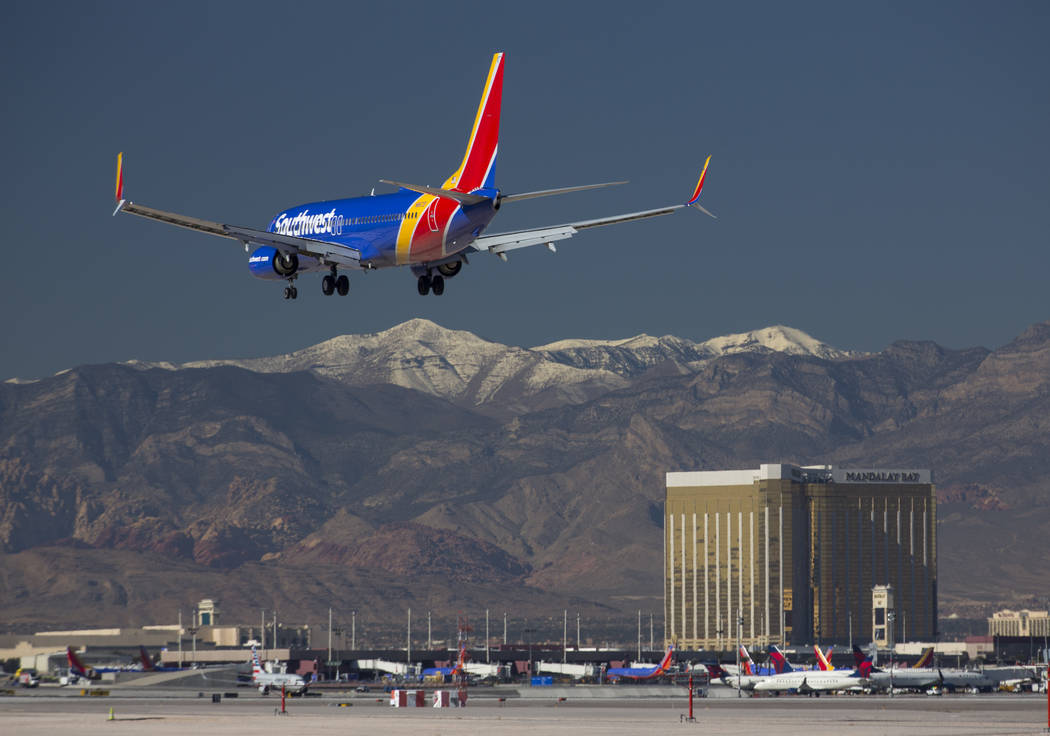 A Southwest Airlines flight descends as it approaches McCarran International Airport in Las Vegas on Monday, Jan. 22, 2018. Richard Brian Las Vegas Review-Journal @vegasphotograph
