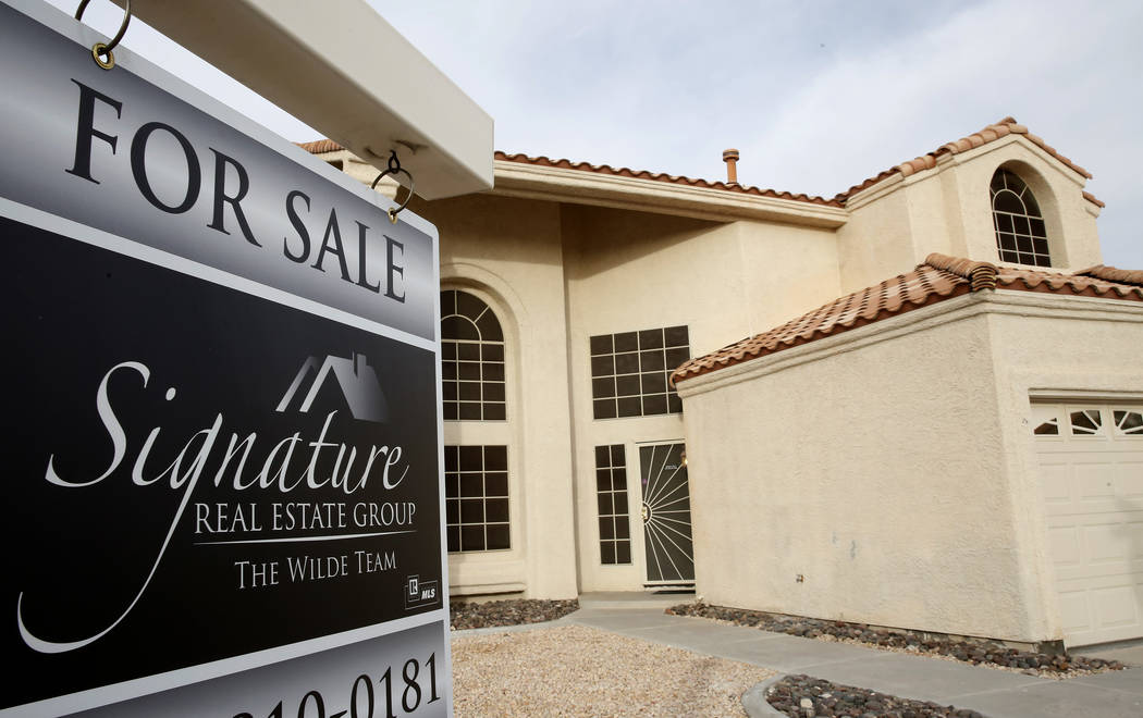 A for sale sign is displayed in front of a home at Gentle Bay Avenue near Windmill Lane Wednesday, Nov. 15, 2017, in Las Vegas. (Bizuayehu Tesfaye/Las Vegas Review-Journal @bizutesfaye)