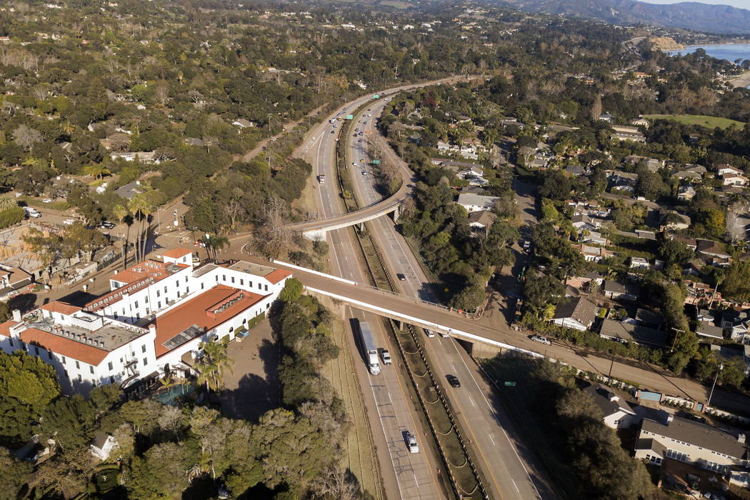 U.S. Highway 101 is open to vehicle traffic in Montecito, Calif., for the first time in two weeks, seen Monday, Jan. 22, 2018, after heavy rain brought flash flooding and mudslides that covered th ...