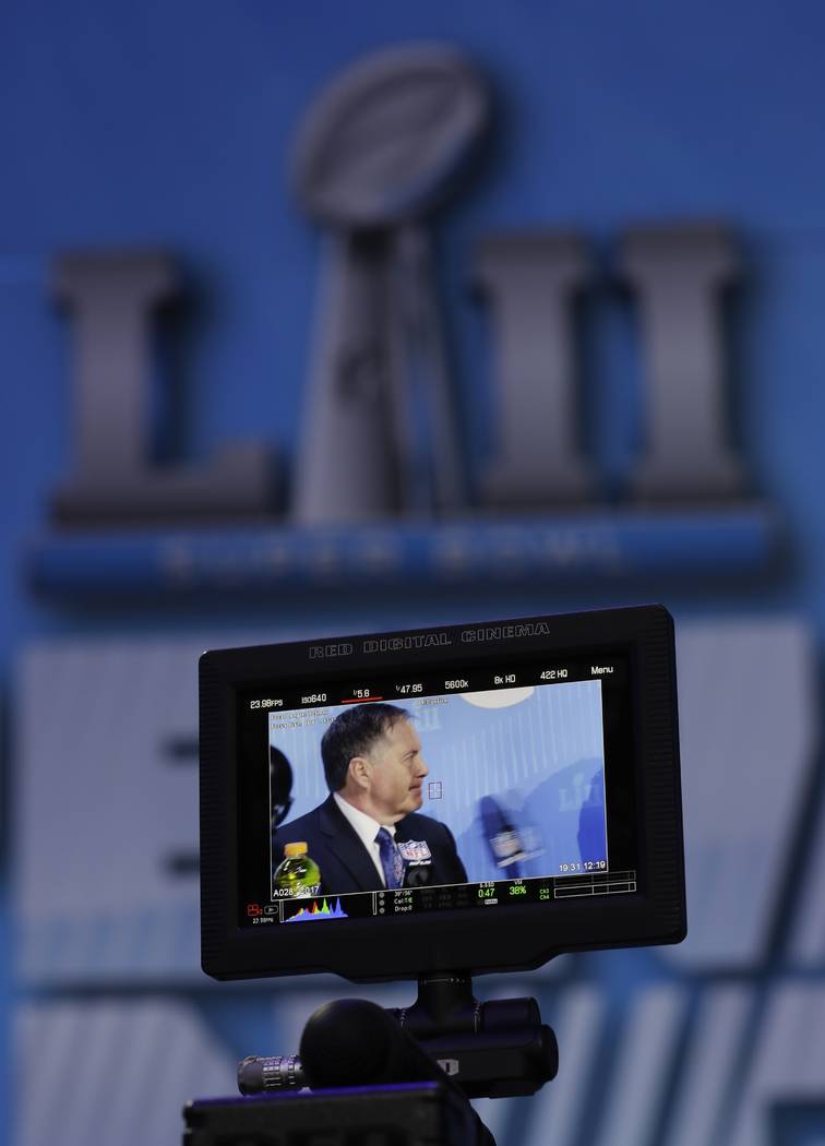 New England Patriots head coach Bill Belichick answers questions during NFL football Super Bowl 52 Opening Night Monday, Jan. 29, 2018, at the Xcel Center in St. Paul, Minn. (AP Photo/Eric Gay)