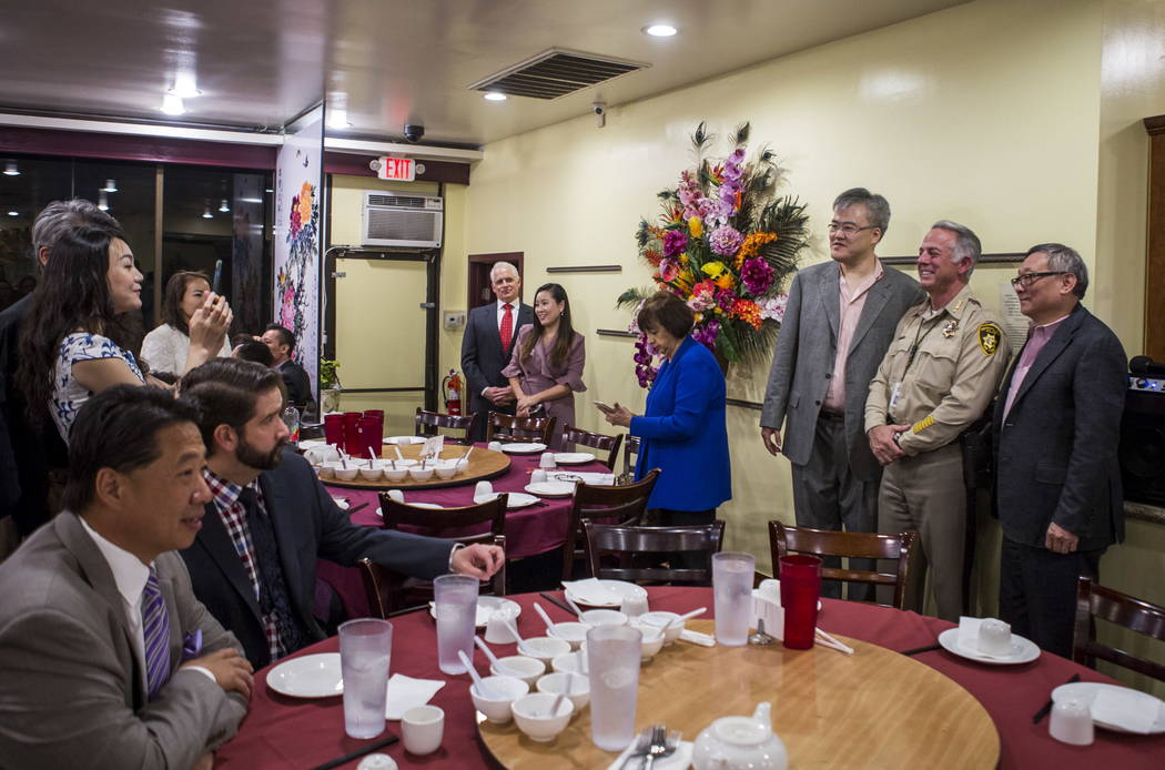 Clark County Sheriff Joe Lombardo has his picture taken with members of the Asian American community in Las Vegas during a dinner event at the Hong Kong Garden Seafood & Dim Sum Cafe on Spring ...
