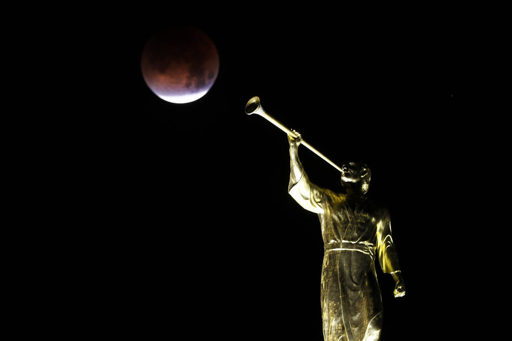 A partially eclipsed super blue blood moon is seen from the Las Vegas Mormon Temple, Wednesday, Jan. 31, 2018 in Las Vegas. David Guzman Las Vegas Review-Journal @DavidGuzman1985