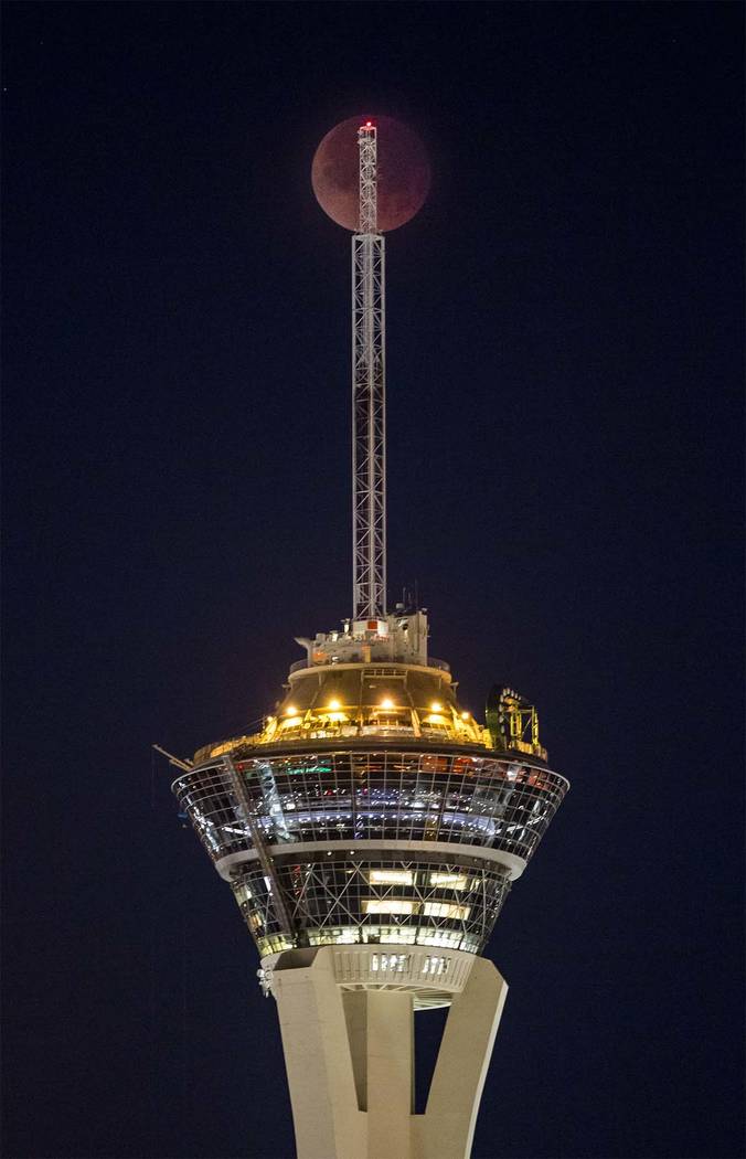 Thesuper blue blood moon over the Stratosphere in Las Vegas on Wednesday, Jan. 31, 2018.  Patrick Connolly Las Vegas Review-Journal @PConnPie