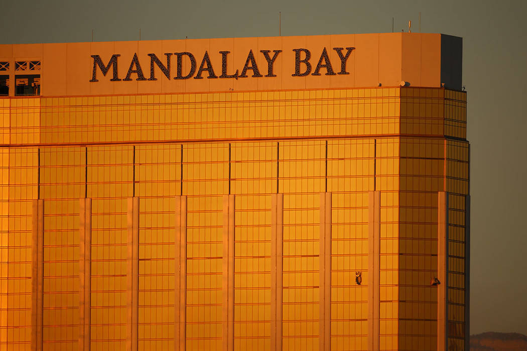 Two windows are blown out from Mandalay Bay the morning after a mass shooting left 58 dead and over 500 injured in Las Vegas, Monday, Oct. 2, 2017. (Joel Angel Juarez/Las Vegas Review-Journal @jaj ...