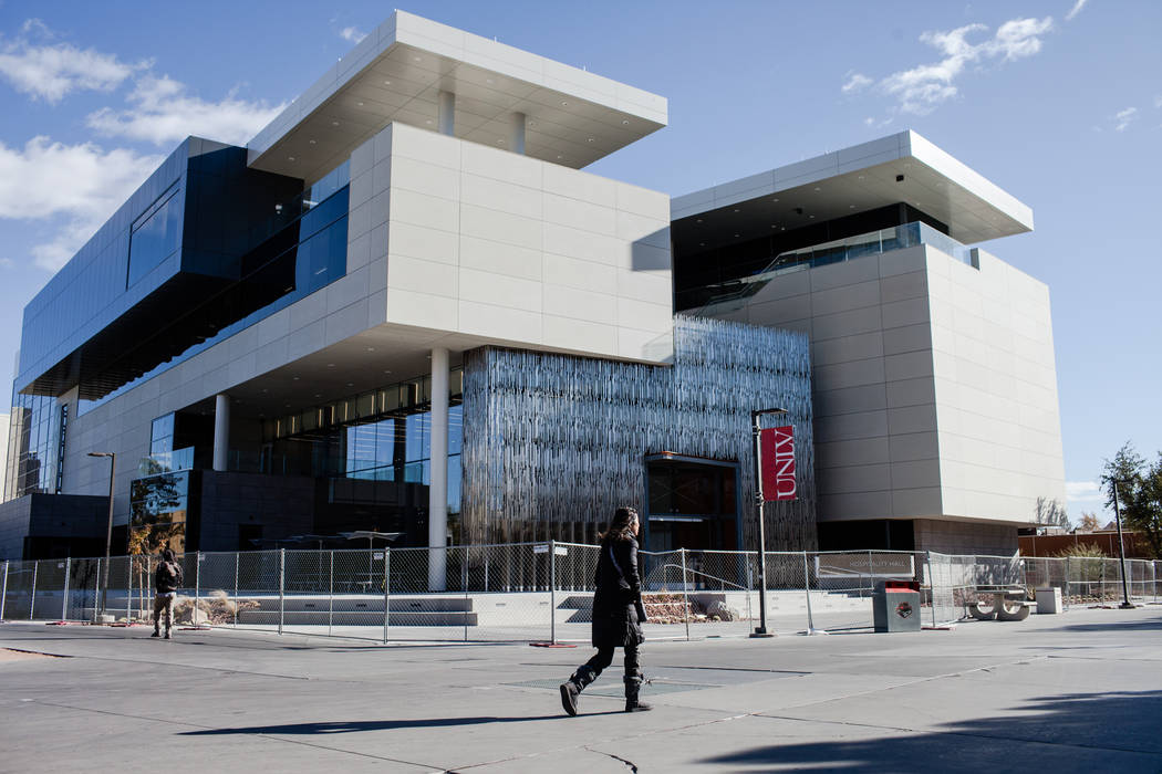 A person walks past Hospitality Hall at UNLV in Las Vegas, Thursday, Dec. 21, 2017. The building is set to open in late January 2018. Joel Angel Juarez Las Vegas Review-Journal @jajuarezphoto
