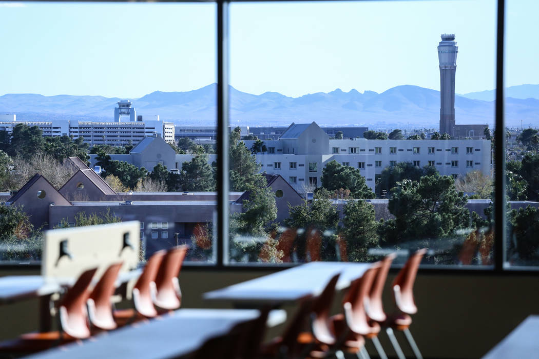 An air traffic control tower at McCarran International Airport is seen in the distance from a classroom at Hospitality Hall at the UNLV in Las Vegas, Thursday, Dec. 21, 2017. The building is set t ...
