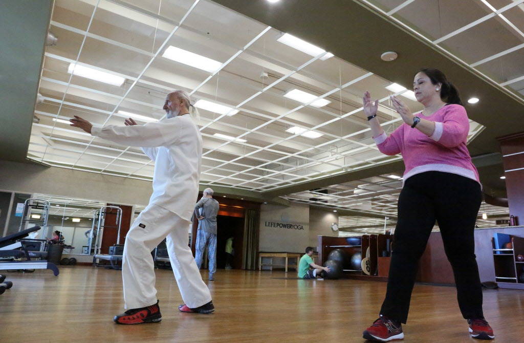 Life Time Fitness Ambassador Laurence Berkley instructs student, Connie Kellers, in Tai Chi at the Life Time Athletic in Summerlin on Wednesday, Dec. 20, 2017. Michael Quine Las Vegas Review-Journ ...