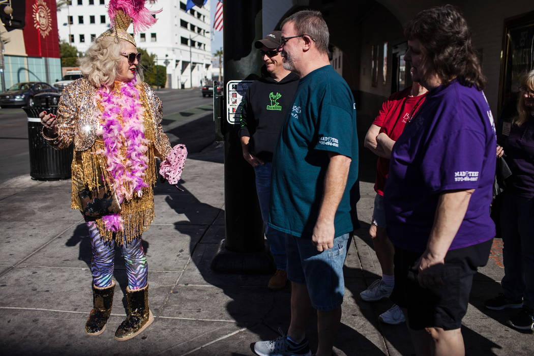 Penny Cuddles Wiggins of Las Vegas, 56, left, leads a group down Fremont Street during the Alibi Las Vegas in Las Vegas, Saturday, Dec. 30, 2017. Joel Angel Juarez Las Vegas Re ...Penny "Cuddles" Wiggins of Las Vegas, 56, left, leads a group down Fremont Street during the Alibi Las Vegas in Las Vegas, Saturday, Dec. 30, 2017. Joel Angel Juarez Las Vegas Review-Journal @jajuarezphoto