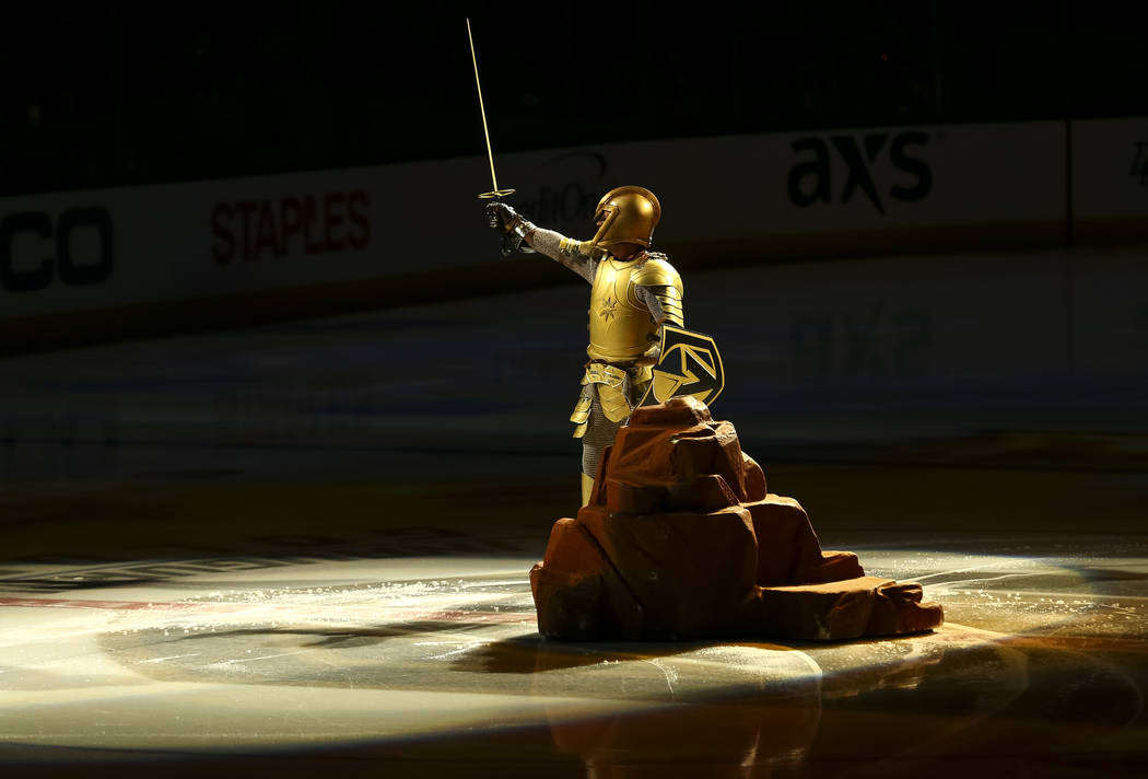 The Golden Knight performs on the ice before an NHL hockey game between the Vegas Golden Knights and the Nashville Predators at the T-Mobile Arena in Las Vegas, Tuesday, Jan. 02, 2018. Richard Bri ...