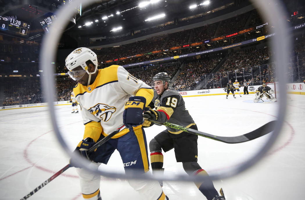 Nashville Predators defenseman P.K. Subban (76) and Vegas Golden Knights right wing Reilly Smith (19) vie for the puck during the second period of an NHL hockey game between the Vegas Golden Knigh ...