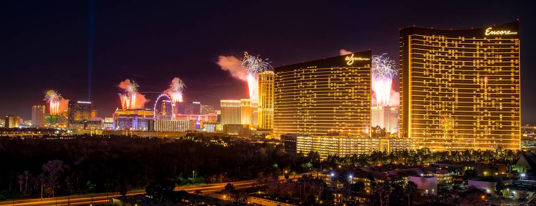 The fireworks of America's Party 2018 explode over the Las Vegas Strip to welcome the new year in this view from the rooftop of the Convention Center Marriott in Las Vegas on Monday, Jan. 1, 2018. ...