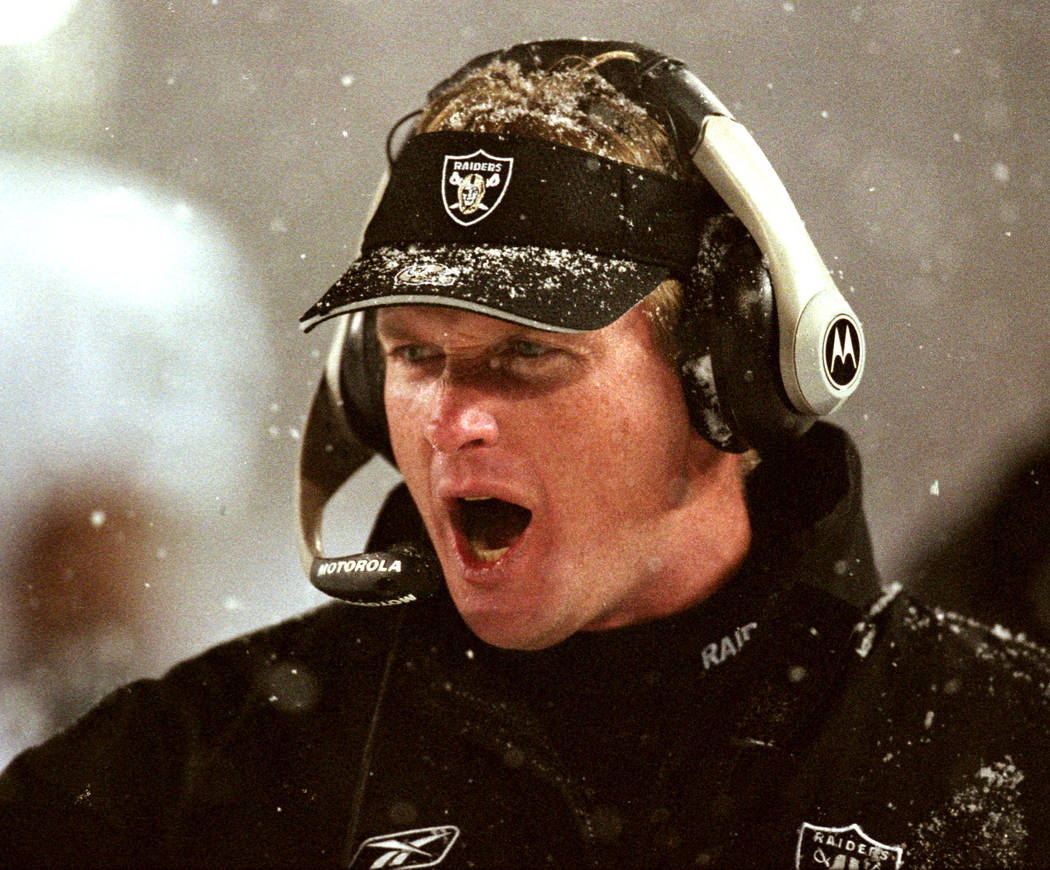 Then-Oakland Raiders head coach Jon Gruden shouts instructions during a 16-13 overtime loss to the New England Patriots in an AFC Divisional playoff game in Foxboro, Mass. Saturday, Jan. 19, 2002. ...