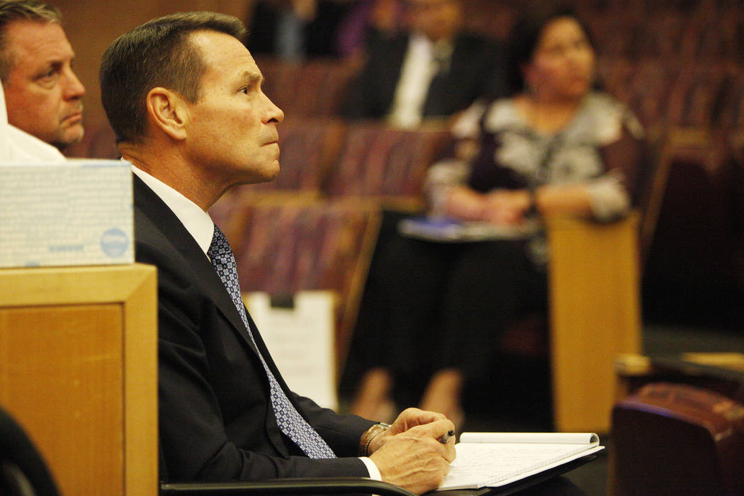Scott Nielson, chairman of the Las Vegas Victims Fund committee, listens to survivors at the Clark County Government Center in Las Vegas, Tuesday, Nov. 28, 2017. It was the second town hall that d ...