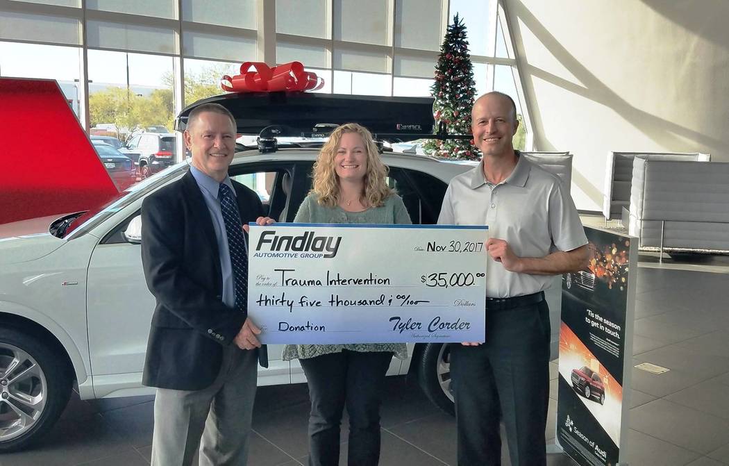 Findlay Automotive
Findlay Automotive Group CFO Tyler Corder, left, and Findlay Automotive Group Director of Operations Justin Findlay, right, present a check for $35,000 to Jill Roberts, CEO of T ...