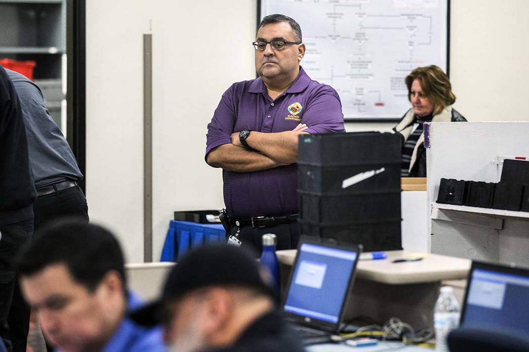 County Registrar of Voters Joe Gloria monitors activity  during a voter recount at the Clark County Election Department office, 965 Trade Drive in North Las Vegas, on Monday, Dec. 7, 2016.  Jeff S ...
