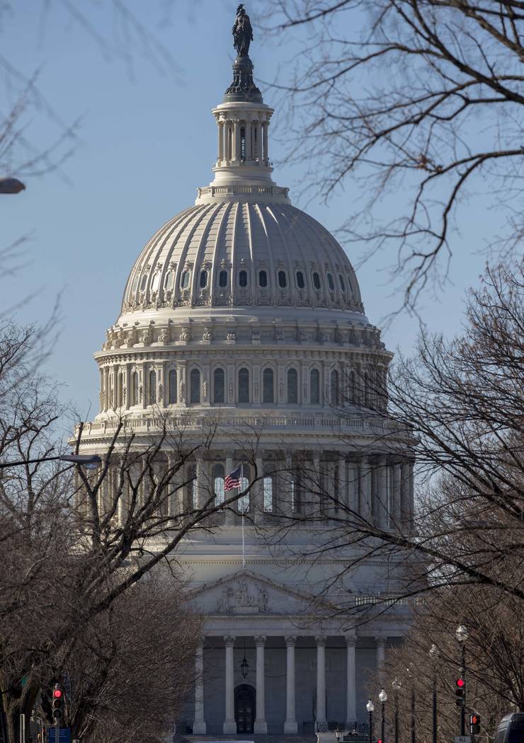 The Capitol is seen in Washington, Tuesday, Jan. 2, 2018, as lawmakers return from the holiday break tomorrow. (AP Photo/J. Scott Applewhite)