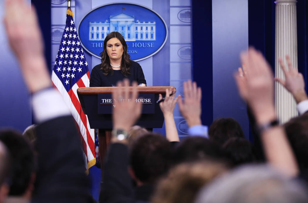 White House press secretary Sarah Huckabee Sanders talks to reporters during the daily press briefing in the Brady press briefing room at the White House, in Washington, Tuesday, Jan. 2, 2018. (AP ...