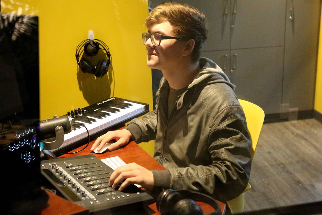 Steven McEntire, 16, takes advantage of the small recording studio at the Clark County Library’s Teen Tech Center which gives kids access to high-tech electronics and other materials with a ...