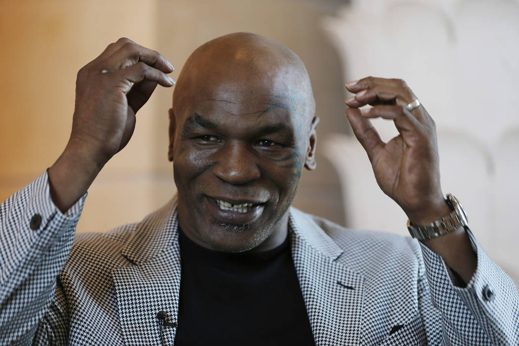 In this May 4, 2017 file photo, Mike Tyson speaks during an interview with The Associated Press, in Dubai, United Arab Emirates. Former heavyweight champion Tyson is becoming a California marijuan ...