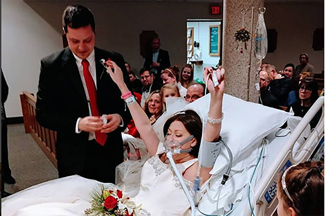 An Instagram photo shows Heather Mosher raising both arms in the air as she and David Mosher said “I do” Dec. 22 at St. Francis Hospital and Medical Center in Hartford, Conn. (christina.lee.ph ...
