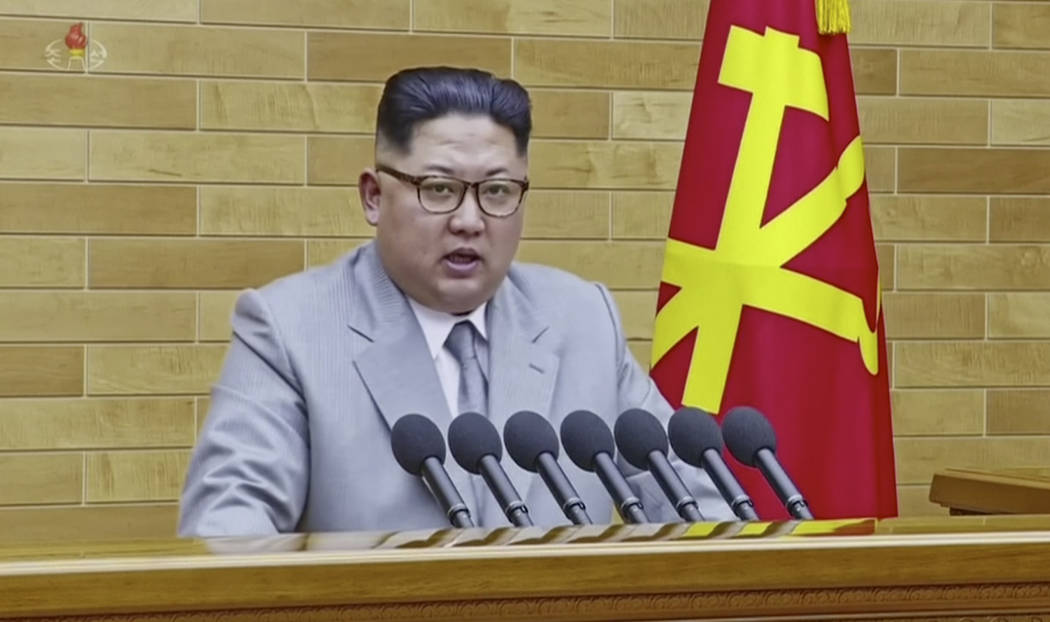 In this image made from video released by KRT on Jan. 1, 2018,  North Korean leader Kim Jong Un speaks in his annual address in undisclosed location, North Korea.  North Korean leader Kim said Mon ...