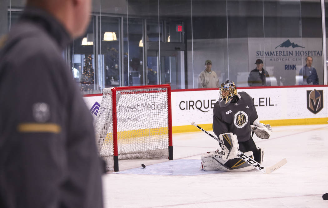 Vegas Golden Knights coach Gerard Gallant, left, watches goalie Marc-Andre Fleury during the NHL team's practice at the City National Arena in Las Vegas, Wednesday, Dec. 6, 2017. Richard Brian Las ...