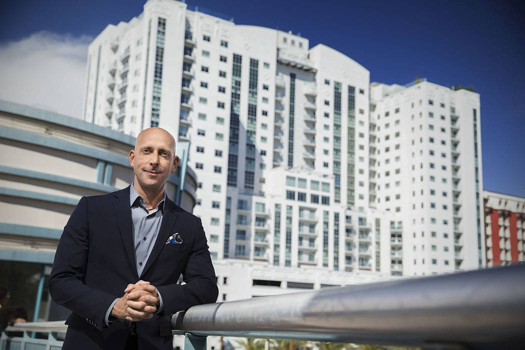 The Ogden 
Uri Vaknin, a partner at KRE Capital, stands in front of The Ogden high-rise in downtown Las Vegas.