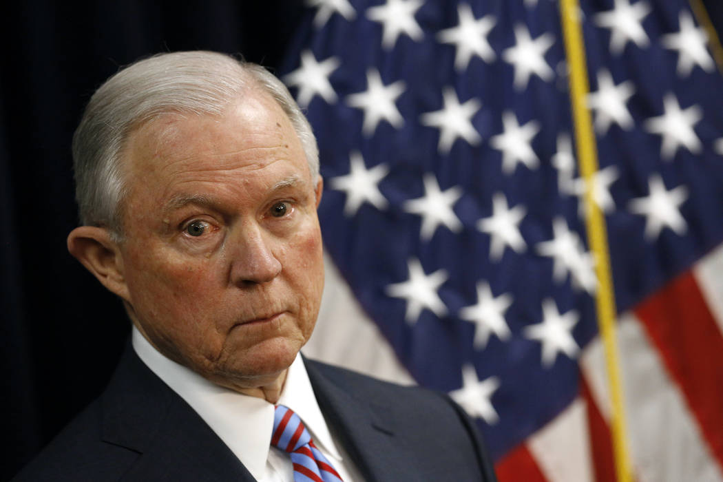 Attorney General Jeff Sessions listens to a reporter's question during a news conference in Baltimore, Tuesday, Dec. 12, 2017, to announce efforts to combat the MS-13 street gang with law enforcem ...