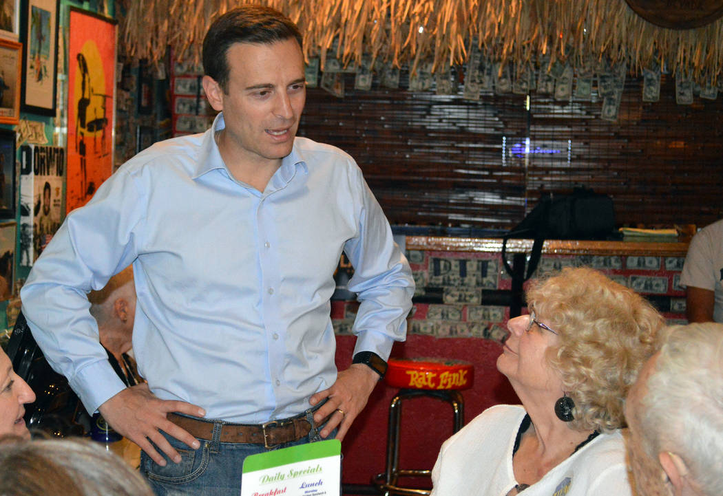 Nevada Attorney General Adam Laxalt talks with Norma Barth at the World Famous Coffee Cup in Boulder City on Tuesday, Nov. 7, about his candidacy for Nevada Governor. Celia Shortt Goodyear/Boulder ...