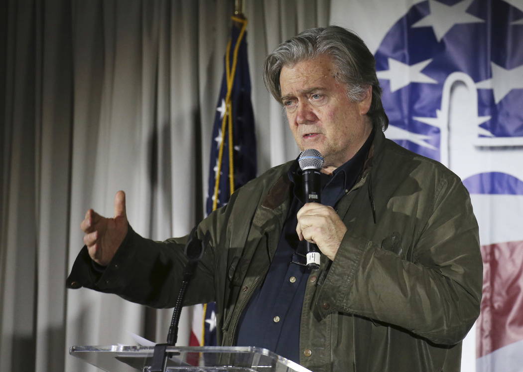 In this Nov. 9, 2017, file photo, Steve Bannon, speaks during an event in Manchester, N.H.  President Donald Trump is blasting his former chief strategist ahead of the release of a new, unflatteri ...